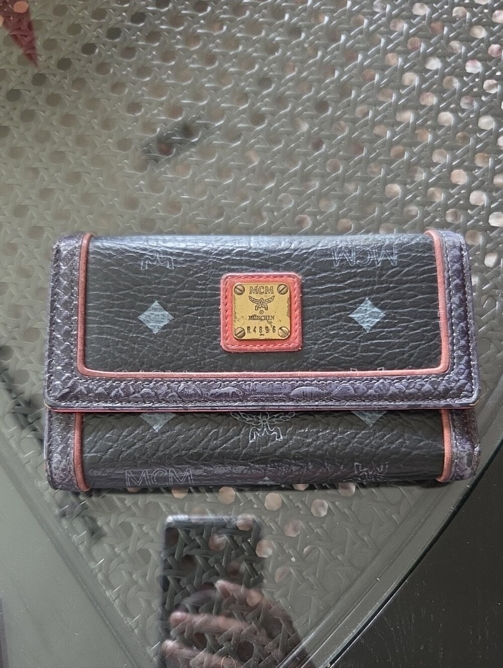 MCM Black Logo Continental Wallet with Brown Trim and Gold Plaque